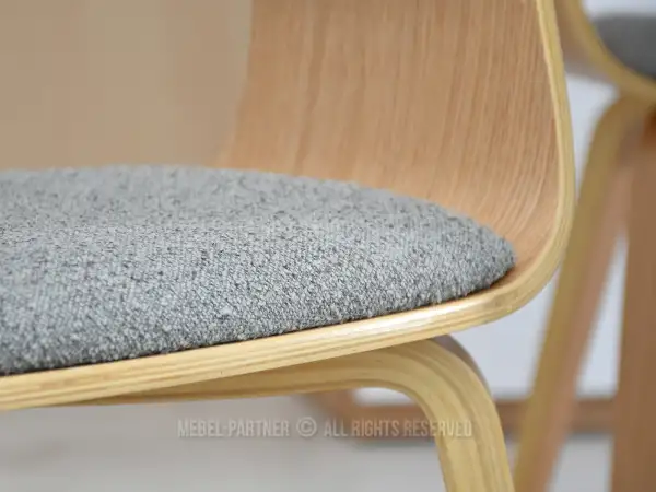 Krzesło tapicerowane tkaniną boucle - idealne do Twojej jadalni